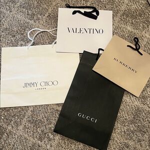 Assortment of designer paper shopping bags.